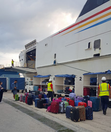 Loading luggage onto the ferry to Malta