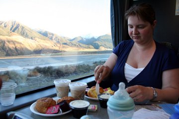 Enjoying a Devonshire cream tea on the Tranz-Alpine train...