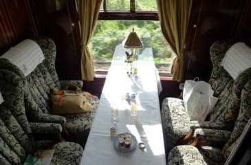 4-seater coup in a Pullman car