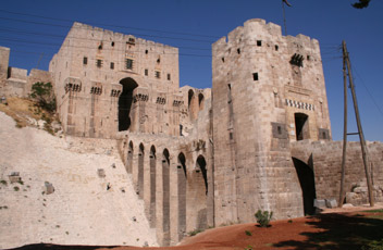The magnificent gate to the citadel in Aleppo, Syria.