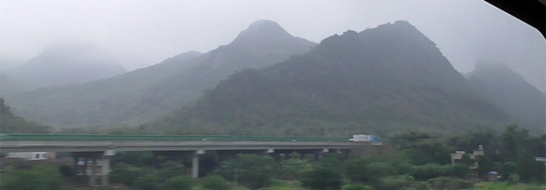 Misty mountain scenery from the Hong Kong to Beijing train