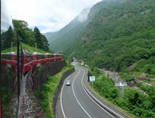 The Bernina Express climbs up the valley from Tirano