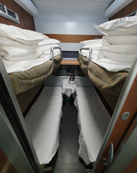 4-berth soft sleeper on 'revival green' CR200J sleeper train
