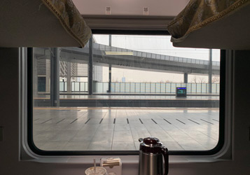 Window on on 'revival green' sleeper train