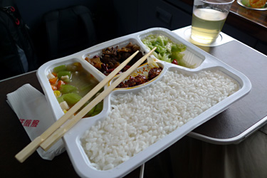 Complimentary tray meal in business class