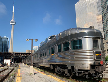 Under the CN Tower, "The Canadian" trans-continental train waits to leave Toronto...